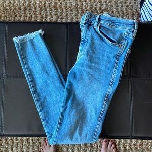 We The Free (free people) high rise jeggings with fringe bottom